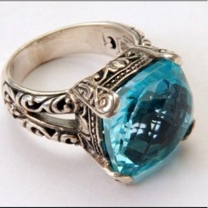 Sterling silver and blue topaz ring made in Indonesia. Size 8.